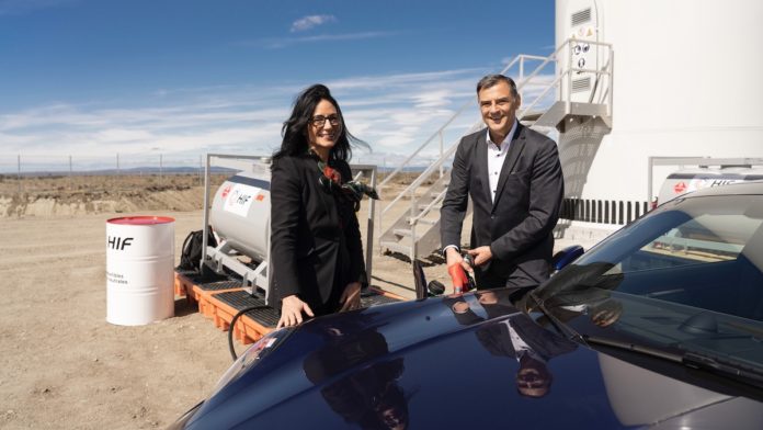 Barbara Frenkel, Member of the Executive Board for Procurement at Porsche AG, and Michael Steiner, Member of the Executive Board for Development and Research at Porsche AG, fuel a Porsche 911.