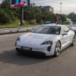 Porsche Taycan making driving north from Johor Bahru