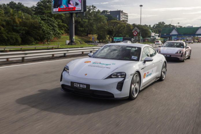 Porsche Taycan making driving north from Johor Bahru