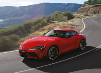 Toyota GR Supra finally arrives with the correct transmission Toyota Supra driving on curved road