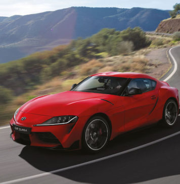 Toyota GR Supra finally arrives with the correct transmission Toyota Supra driving on curved road